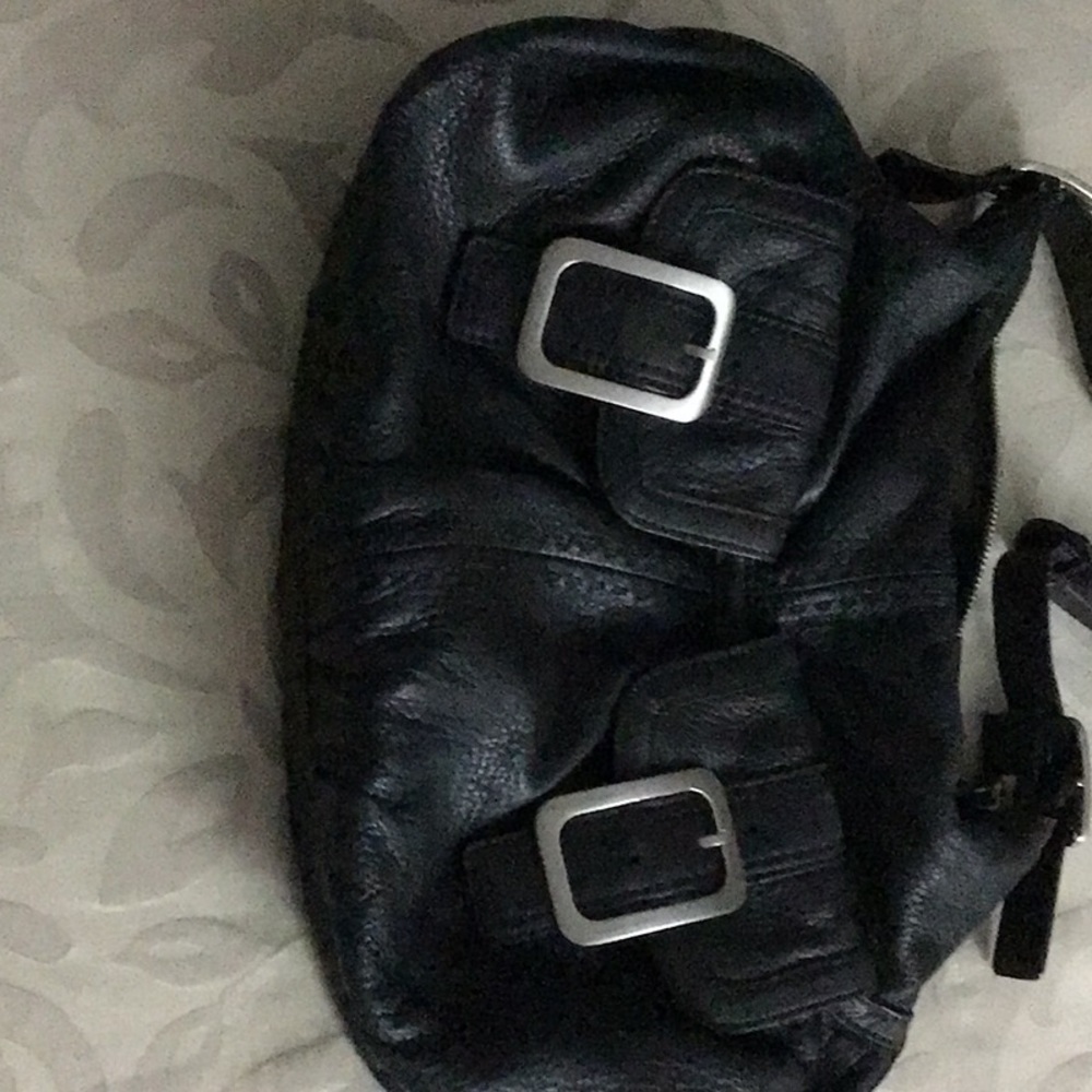 Cole Han black leather satchel purse with front pockets, buckles.